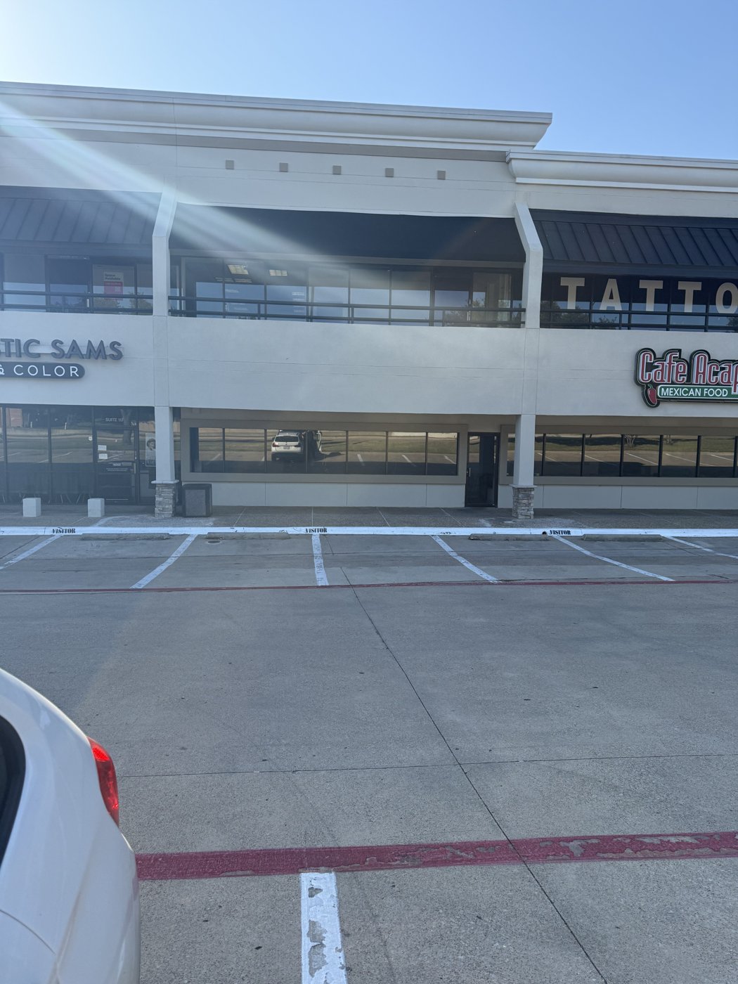 Cafe Acapulco storefront within the Green Oaks retail strip